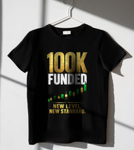 Load image into Gallery viewer, 100K Funded Tee - black tee with the 100K Funded print, hanging product photo